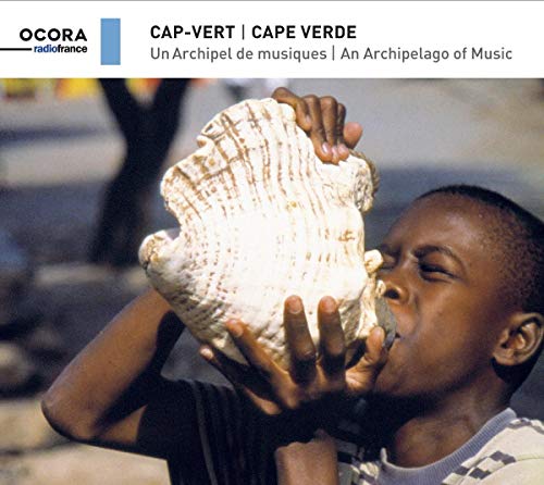"CD cover featuring a boy blowing into a large seashell, with text above."