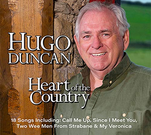 "Hugo Duncan's 'Heart of the Country' CD cover featuring a smiling man in a green shirt."
