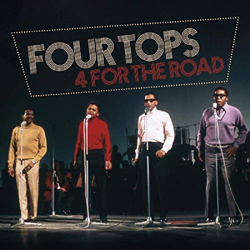 "CD cover featuring The Four Tops singing into microphones on stage, band in background."