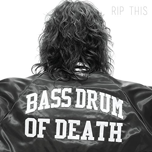 Black and white image of a person wearing a jacket with "Bass Drum of Death" text.