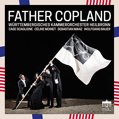 "CD cover with four musicians in black holding a white flag with black square."