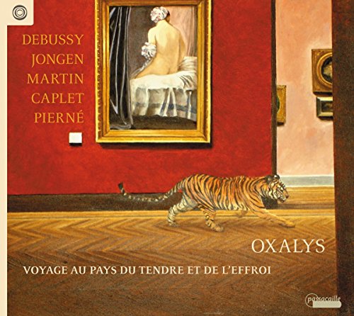 "CD cover featuring a tiger in a room with a framed painting."