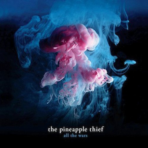 Album cover with pink and blue smoke against a dark background, titled "all the wars".