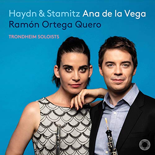 CD cover featuring a man and woman against a blue background.