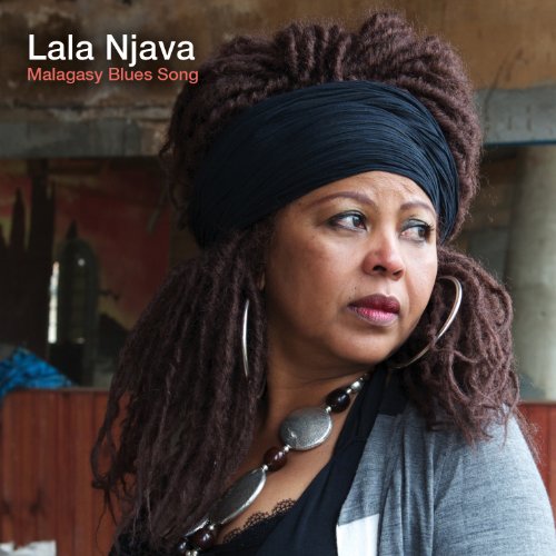 Woman with dreadlocks and headband on CD cover, looking to the right, with artist's name.