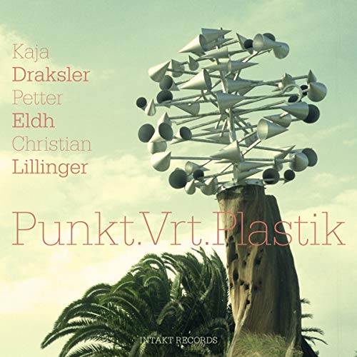 A CD cover featuring a tree stump with a metal sculpture against a cloudy sky.