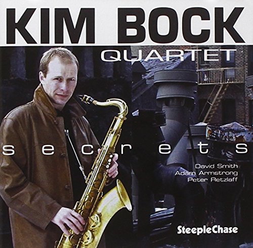 "Album cover featuring a man holding a saxophone, with dark background and text overlay."