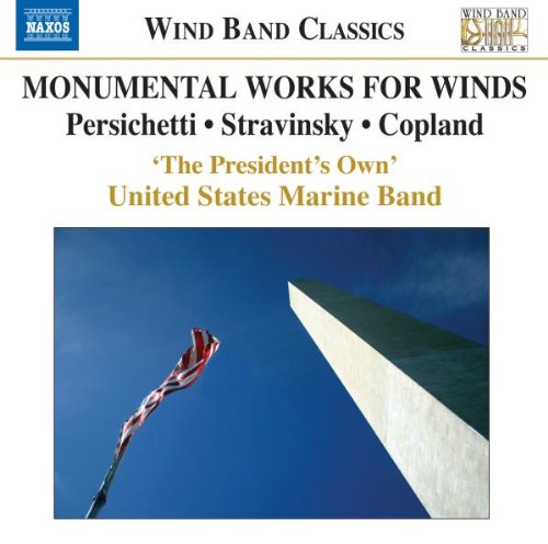 "CD cover with a white monument and a waving American flag against a blue sky."