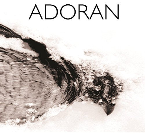 A bird's head is partially buried in snow, with the word "ADORAN" above.