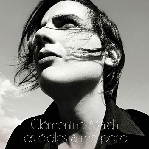 Black and white album cover featuring a woman with wind-blown hair and closed eyes.