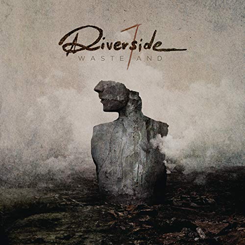 "Album cover featuring a broken stone statue in a desolate landscape with dark, cloudy sky."