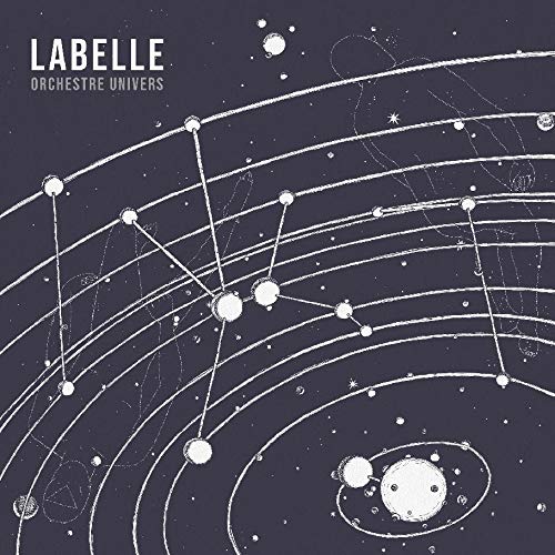 The image depicts a vinyl record cover featuring a dark blue background with white illustrations of planets and stars. A concise, descriptive alt text for this image could be: "Dark blue vinyl cover with white planet and star illustrations."