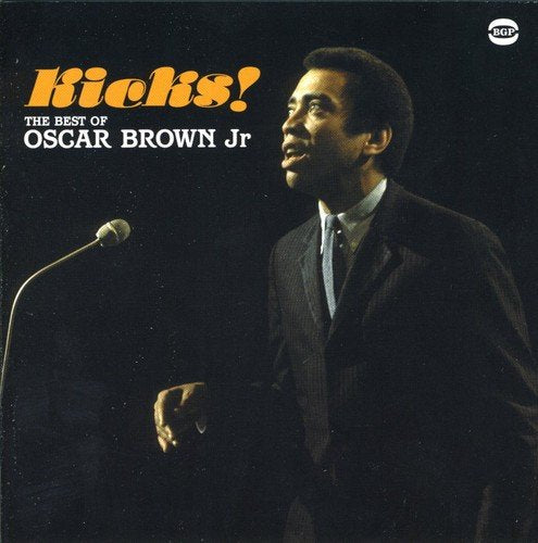 "Oscar Brown Jr. album cover featuring a man in a suit singing into a microphone."