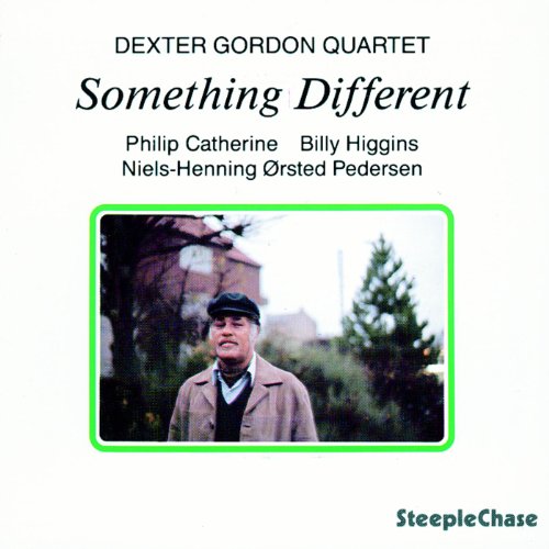 "CD cover featuring a man in a hat and coat outdoors, with text and logo."