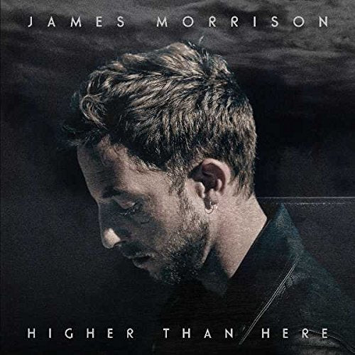 Album cover featuring a man with short hair, gazing downward against a dark background.