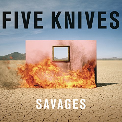 "Album cover: burning wall with a mirror, in a desert landscape."