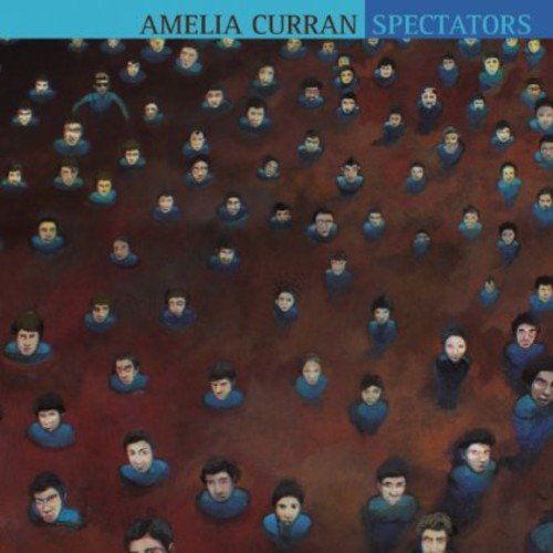 Album cover with crowd of people in blue, artist name and title at top.