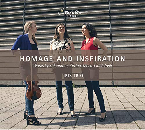 "CD cover featuring three women standing outside, one holding a violin case."