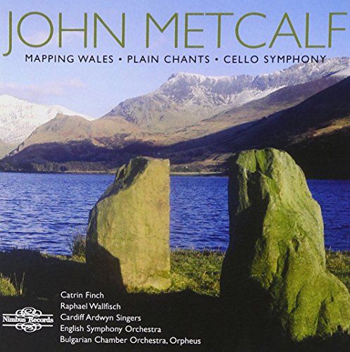 "CD cover featuring mossy stones by a lake with mountains in the background."