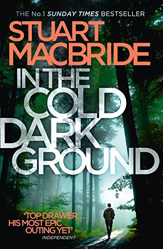 Book cover with title "In the Cold Dark Ground" and a man in a forest.