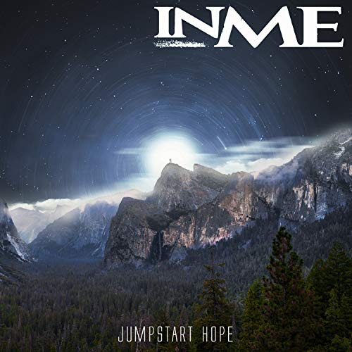 Vinyl album cover with a mountain landscape and starry night sky.