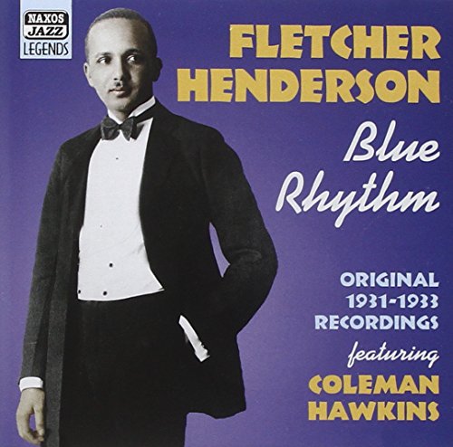 "CD cover featuring a man in a tuxedo against a blue background."