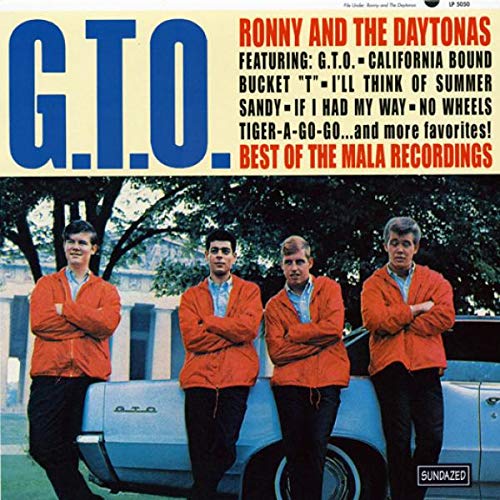 Vinyl album cover with four men standing by a light blue car.