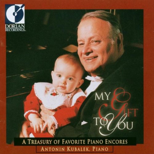 CD cover featuring a man holding a baby, with text "My Gift to You".