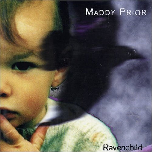 "CD cover featuring a close-up of a child's face with finger to lips."