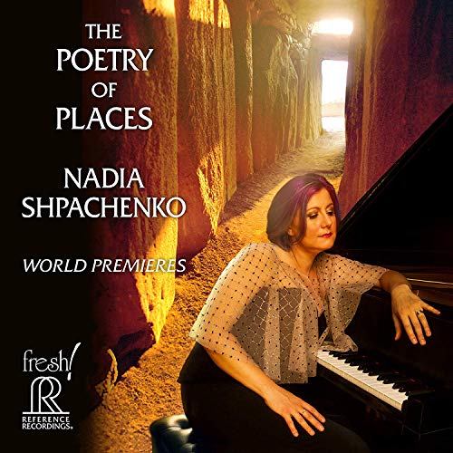 "CD cover featuring a woman playing piano in a stone passageway."