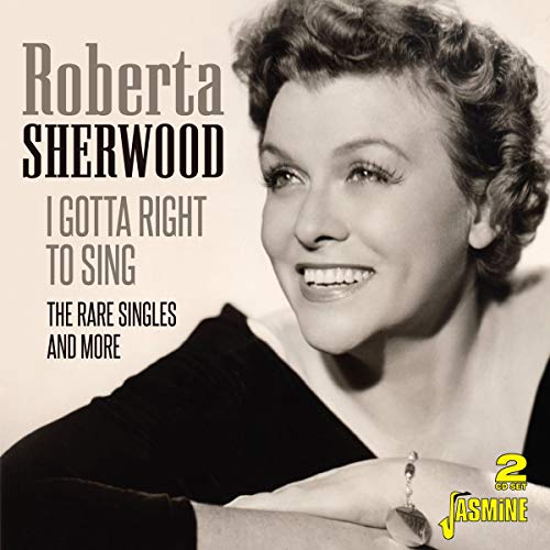 Black and white CD cover featuring a smiling woman with short curly hair.