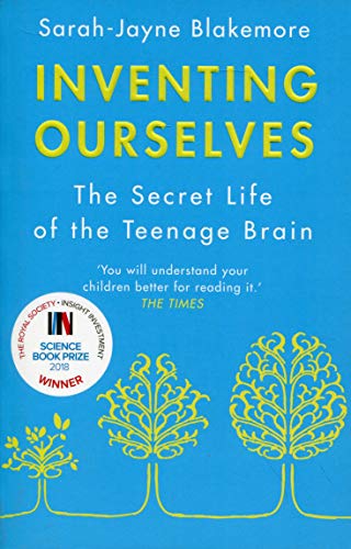"Blue book cover with yellow trees and title 'Inventing Ourselves: The Secret Life of the Teenage Brain'."