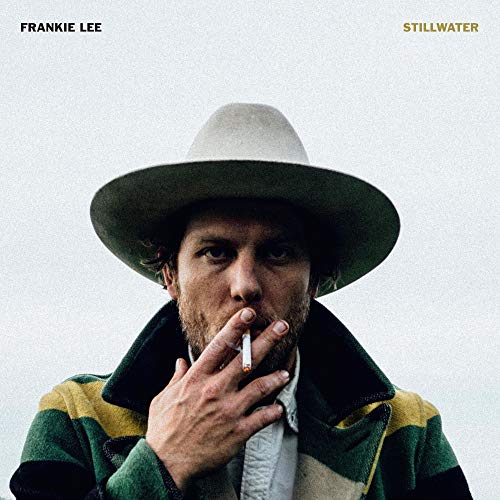 Album cover featuring a man in a hat smoking a cigarette.