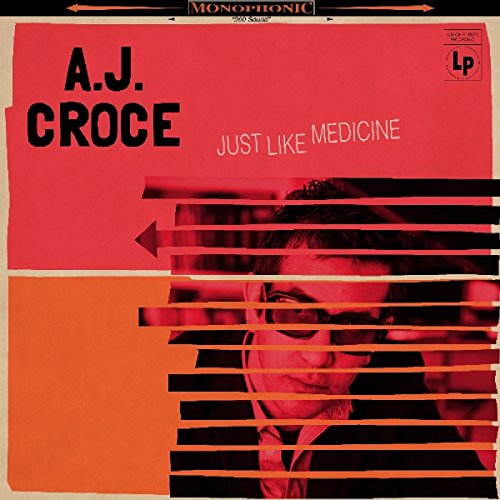Vinyl album cover with red background, A.J. Croce's image behind horizontal red lines.