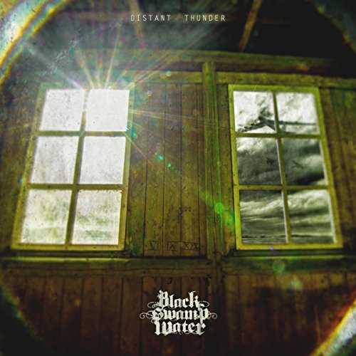 Album cover with two windows reflecting a stormy sky, gothic text at the bottom.