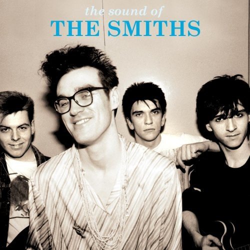 "Album cover featuring a black and white photo of four men, titled 'The Smiths'."