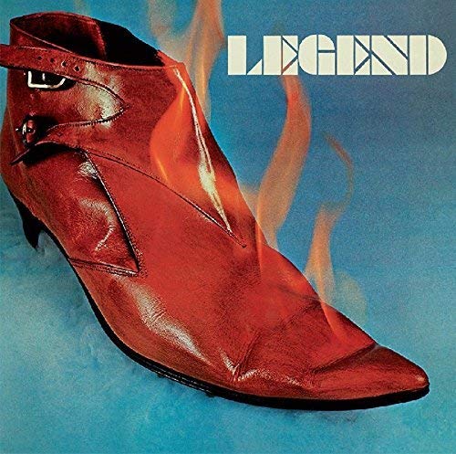 "Vinyl album cover featuring a red leather boot with flames on a blue background."