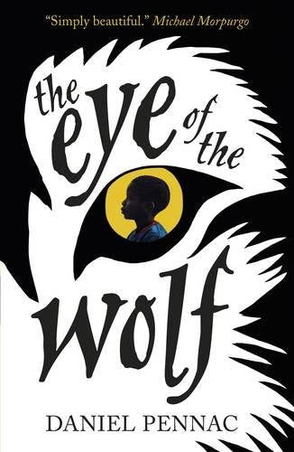 The image depicts a book cover with a wolf's eye and a child's silhouette.