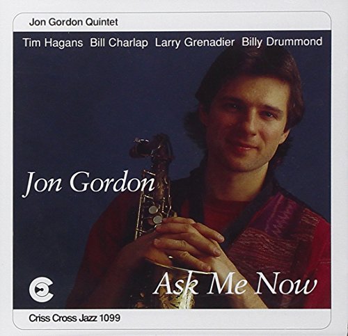 "CD cover featuring a man holding a saxophone with text overlay."