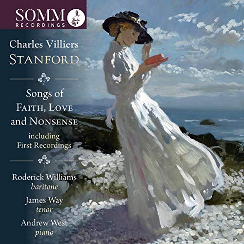"CD cover featuring a woman in white dress on a rocky shore."