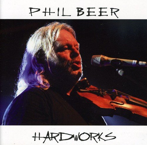 Album cover with Phil Beer singing and playing guitar, surrounded by microphone, on black background.