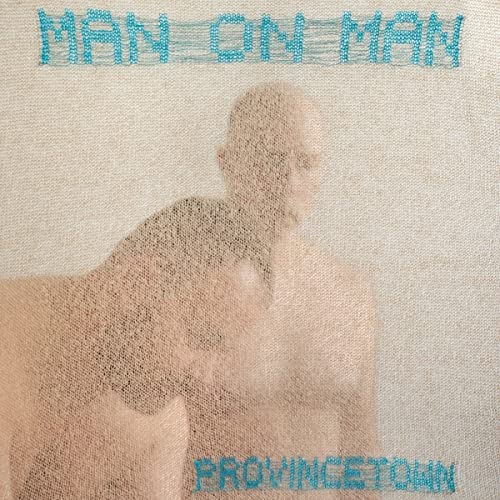CD cover featuring a textured, semi-transparent image of two men.