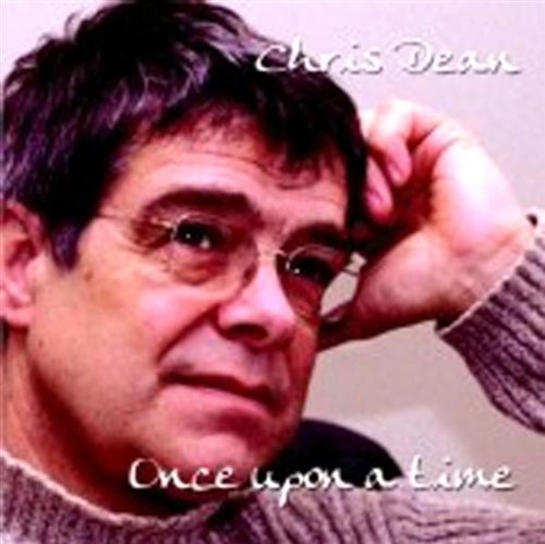 Album cover featuring a man with glasses and a contemplative expression.