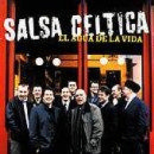 A blurry image of a CD cover featuring a group of men standing together.