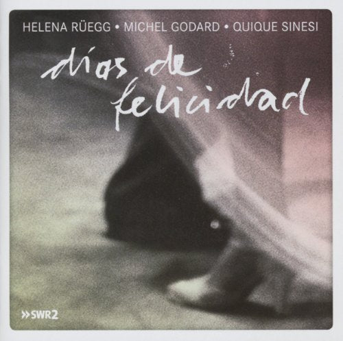 "CD cover with a blurry image of a foot and the title 'dias de felicidad'."