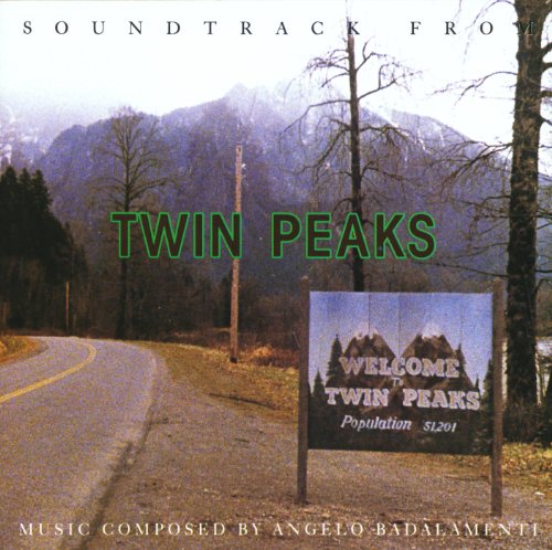 "Twin Peaks soundtrack CD cover featuring a road sign and mountain landscape."