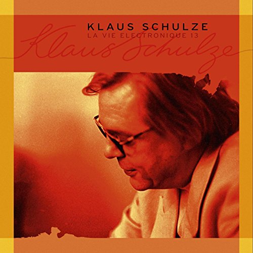"Album cover featuring Klaus Schulze with orange-toned photo and text overlay."