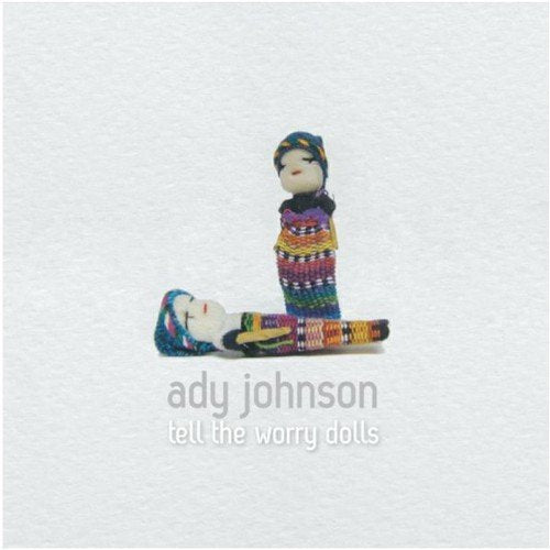 "Album cover featuring two worry dolls with beaded bodies on a white background."