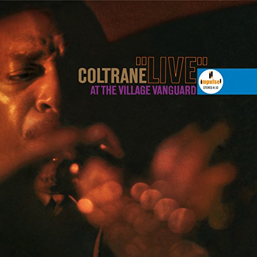 The album cover for "Live at the Village Vanguard" by John Coltrane features a close-up of his face, with the title and artist name prominently displayed. The image is a concise representation of the product, focusing on the essential visual elements. Alt text: Close-up of John Coltrane's face on album cover with title and artist name.
