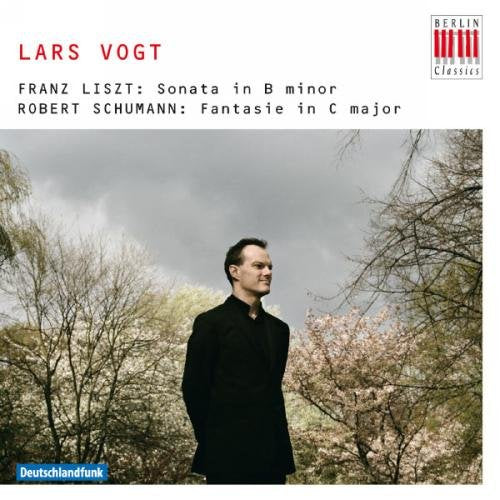 A man in a black coat stands among trees on a classical music CD cover.